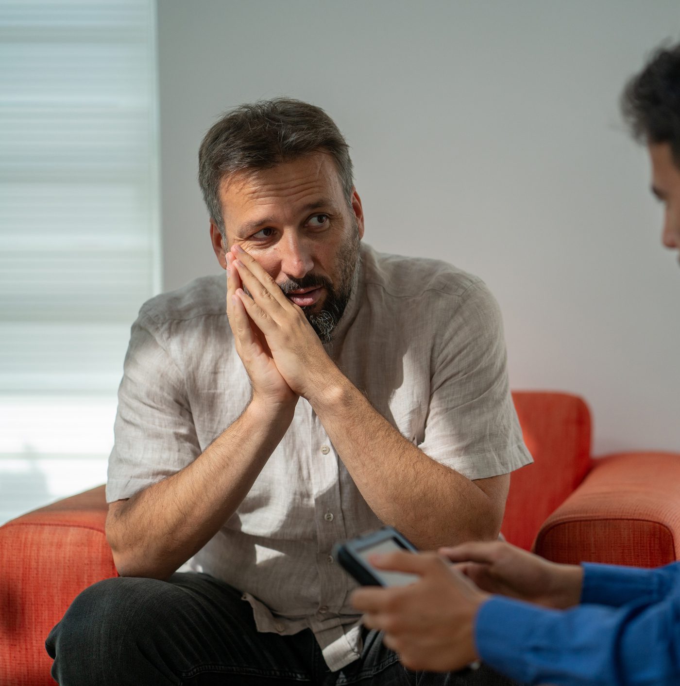 Man listening thoughtfully